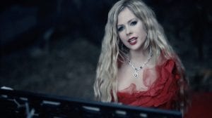 See Avril Lavigne’s Gorgeous “I Fell In Love With The Devil” Music Video